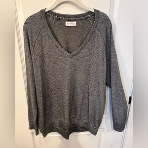 Navy and white striped v-neck top. Very soft